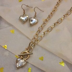 Heart necklace and matching earrings in clear rhinestone and gold tone.
